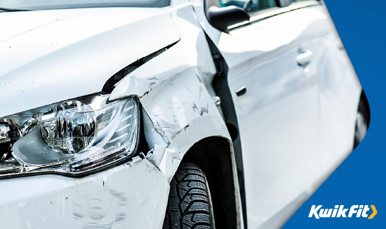 Damage to the front side panel of a car
